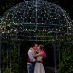 Romantic evening kiss shared by a couple at a scenic Stone Manor picture spot