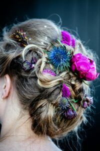 a photo of floral-adorned bridal hairstyles