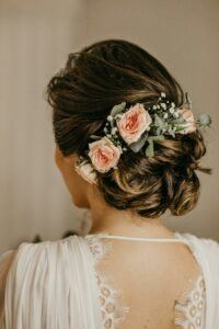 a photo of floral-adorned bridal hairstyles