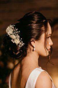 a photo of a sleek bridal bun hairstyle